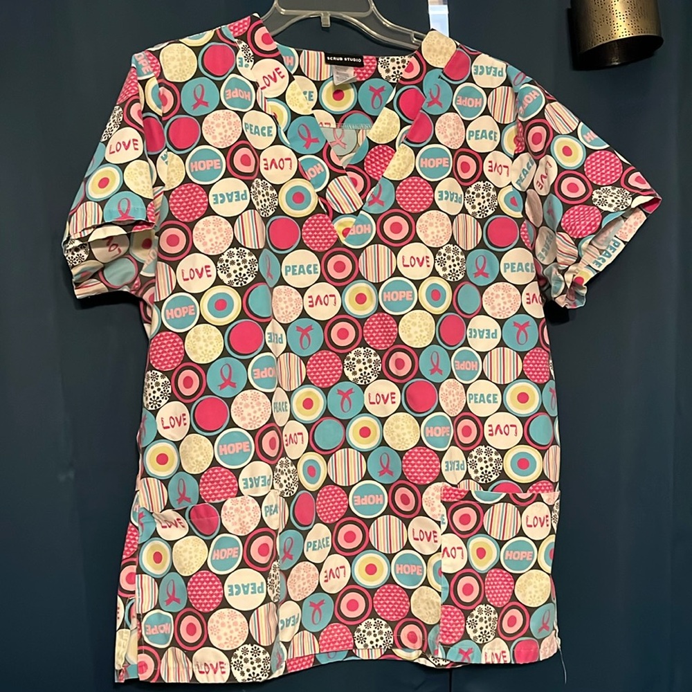 Breast cancer awareness scrub top.